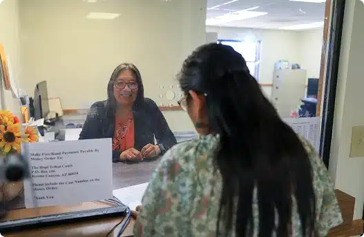 Hopi Court Staff helping a customer Hopi Court Staff helping a customer